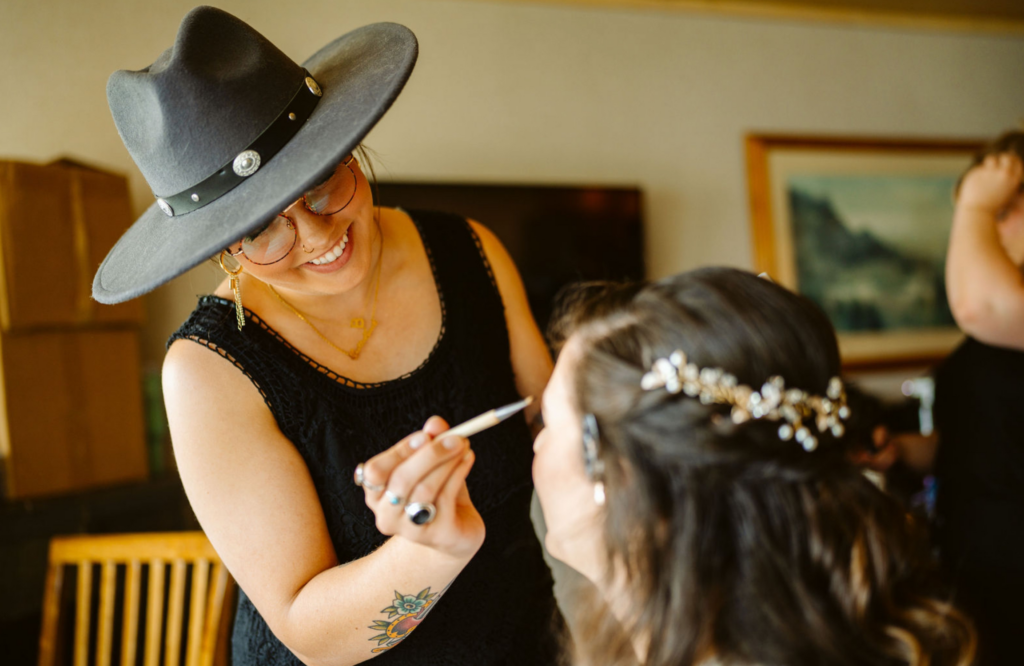 Bridal hair and makeup being done by Hustle and Heart Salon in Duluth Minnesota.