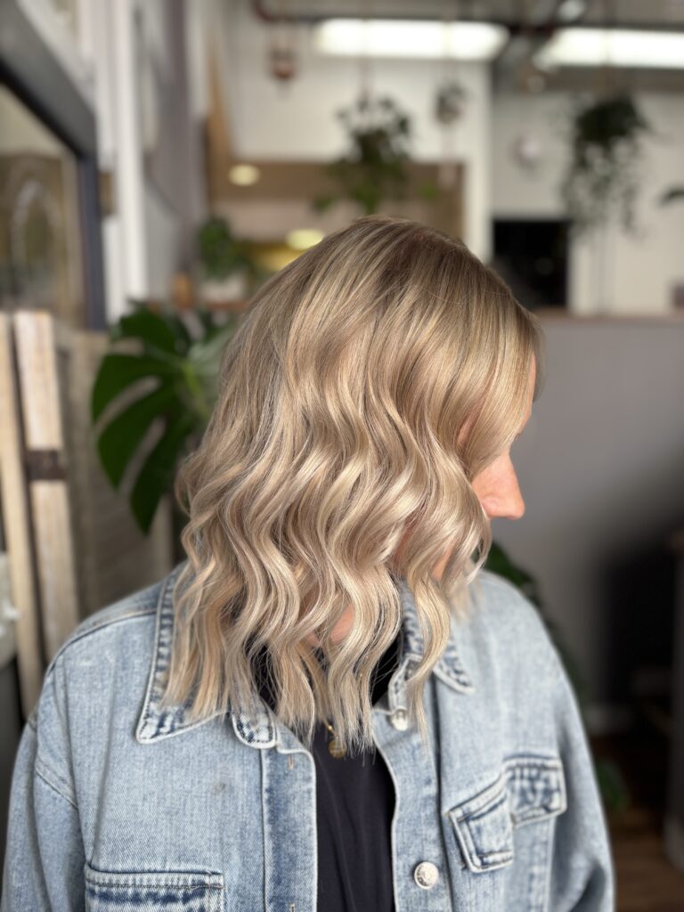 Before and after of NBR hair extensions done by Hailey at Hustle and Heart Salon in Duluth Mn.